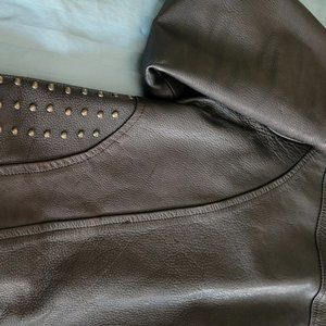 Womens Leather hip length black jacket with stubs